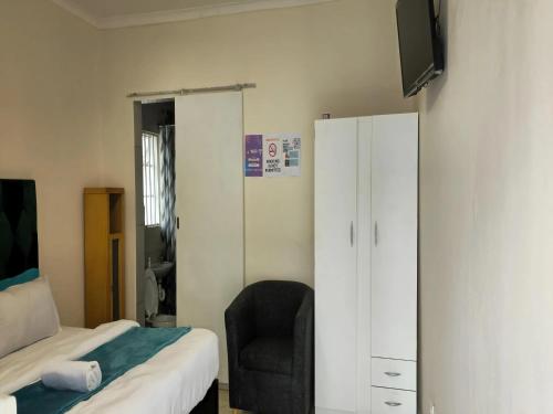 Кровать или кровати в номере Goshen Lodge Spencer