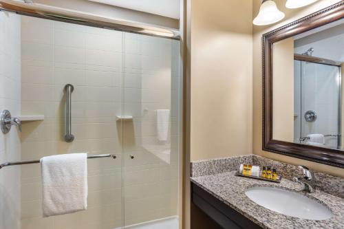 a bathroom with a sink and a shower at Best Western Plus Intercourse Village Inn in Intercourse