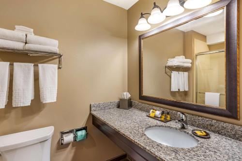 a bathroom with a sink and a mirror at Best Western Plus Intercourse Village Inn in Intercourse