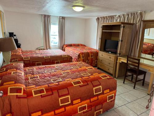 Postel nebo postele na pokoji v ubytování El Ray Motel