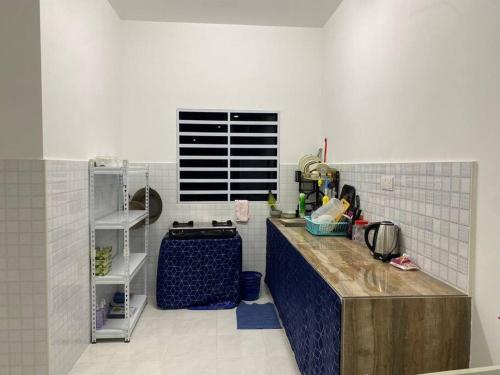 Kuchyň nebo kuchyňský kout v ubytování Homestay AZ