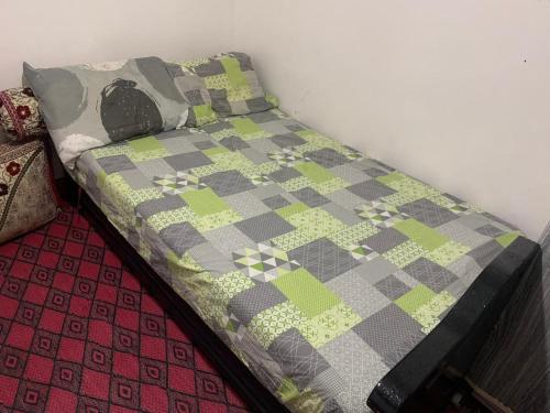 Un ou plusieurs lits dans un hébergement de l'établissement Chembre for rent à taghazout