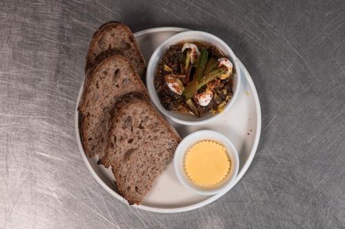 a plate of food with bread and a bowl of soup at The Coach House in Roundwood