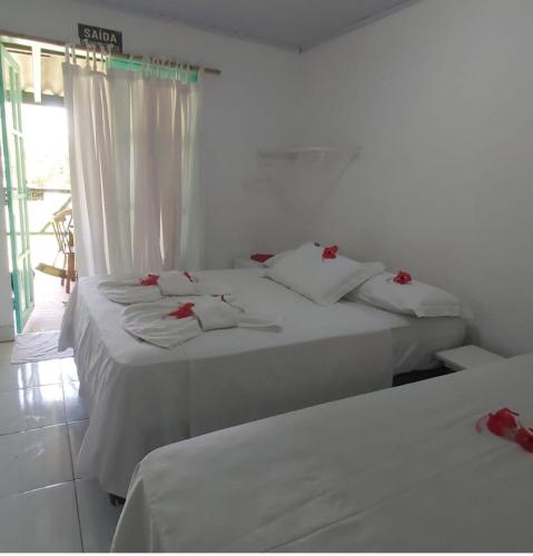 En eller flere senge i et værelse på Casa de Samuel Lobritis