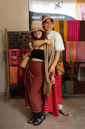 a man and a woman standing in front of a store at Aranka Tempasan in Sangyang