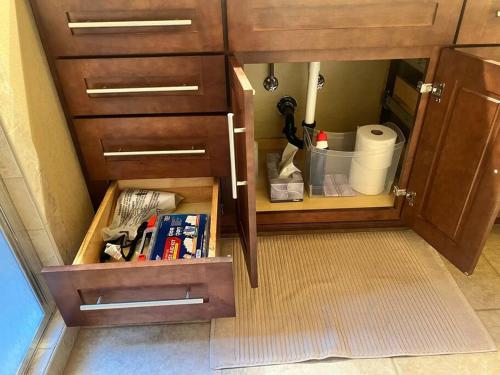 a cupboard withartmentsigunigunigunigunigun at The Bluejay Cabin at Munds Park, AZ! in Sedona