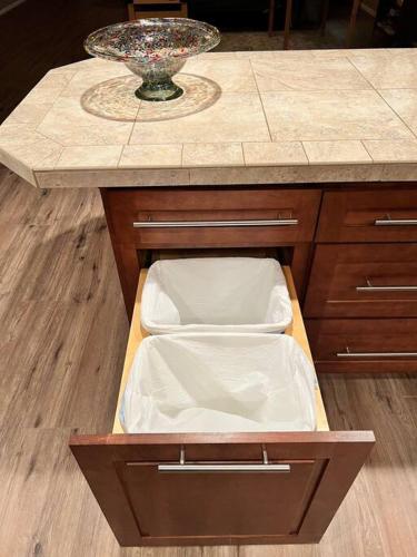 an open drawer in a counter with a sink at The Bluejay Cabin at Munds Park, AZ! in Sedona