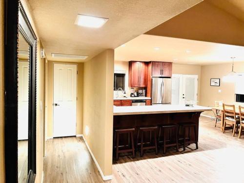 a kitchen with a large island in a room at The Bluejay Cabin at Munds Park, AZ! in Sedona