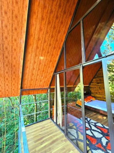 Gambar di galeri bagi Ecoglamping entre árboles di Tarbaca