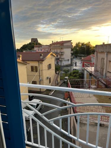a view of a city from a balcony at B&B Santorini in Scalea