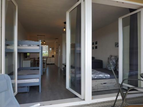 Katil atau katil-katil dalam bilik di Apartmán One To One