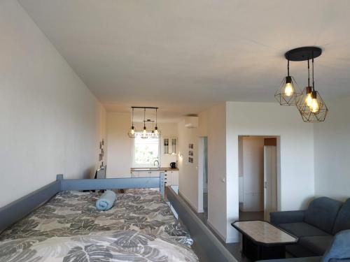 Katil atau katil-katil dalam bilik di Apartmán One To One