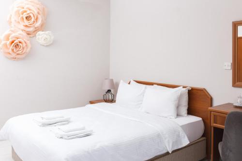 Giường trong phòng chung tại Homelike Guest house