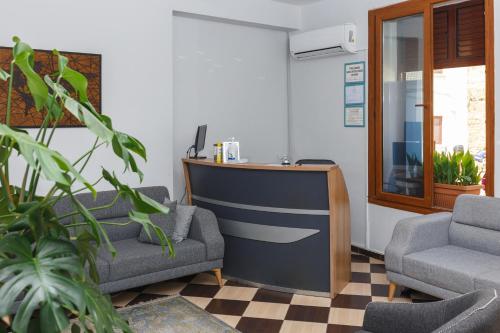 Khu vực ghế ngồi tại Homelike Guest house