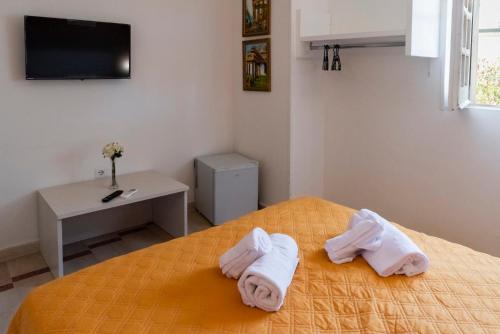 Letto o letti in una camera di SOLARIS PAESTUM