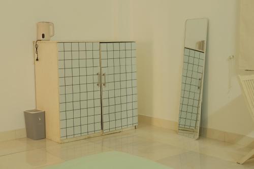 Phòng tắm tại Nhà Bơ Homestay Đà Nẵng