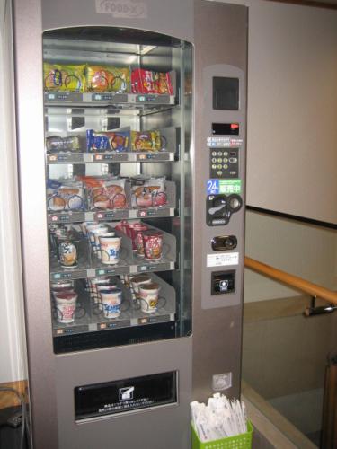 a vending machine with food and drinks in it at Racine Shinmaebashi in Maebashi