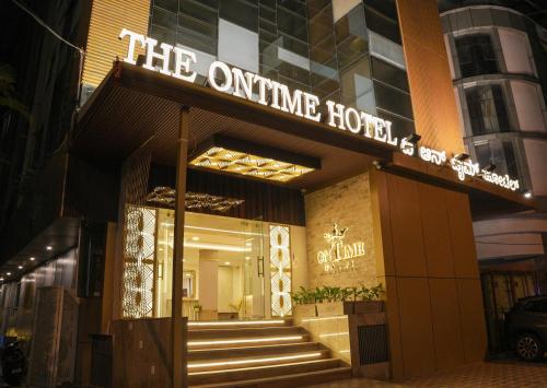 a building with a sign that reads the online hotel at The Ontime Hotel, Bangalore in Bengaluru