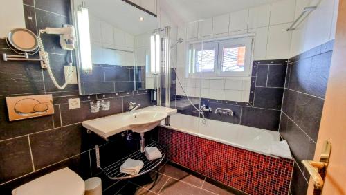 Koupelna v ubytování Amber Ski-in/out Hotel & Spa