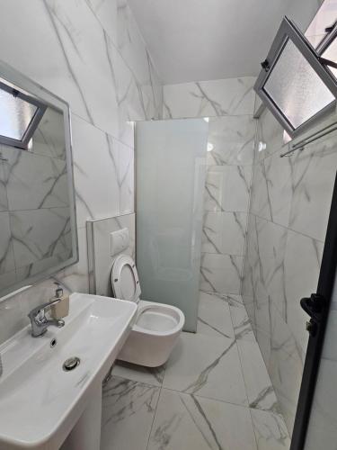 Koupelna v ubytování Hotel Irini