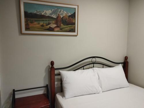 Katil atau katil-katil dalam bilik di Eleni`s Guest House