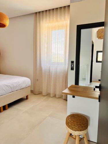 Ένα ή περισσότερα κρεβάτια σε δωμάτιο στο Norte Luxury Villas