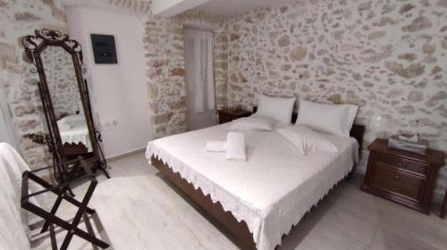 Letto o letti in una camera di Ξενώνας "Alexandra's Coffee House"