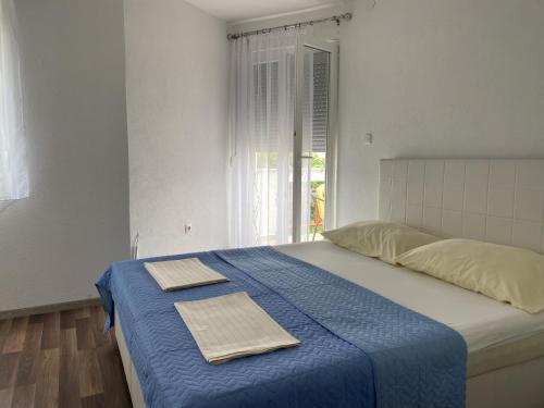 Postel nebo postele na pokoji v ubytování Villa Sekki