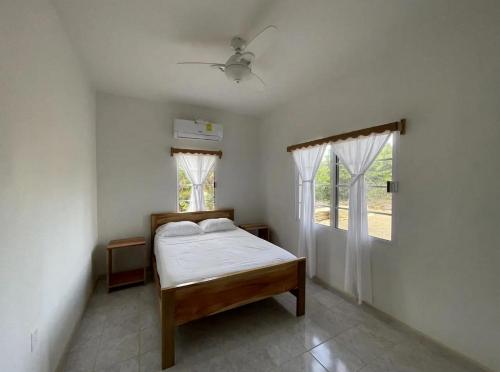 Katil atau katil-katil dalam bilik di Beach House