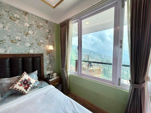 Katil atau katil-katil dalam bilik di Yepplo's Luxury Deluxe Room with Mountain View