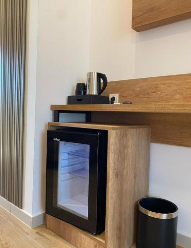 Η κουζίνα ή μικρή κουζίνα στο Hotel Comfort & Villas