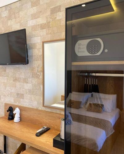 Μια τηλεόραση ή/και κέντρο ψυχαγωγίας στο Hotel Comfort & Villas