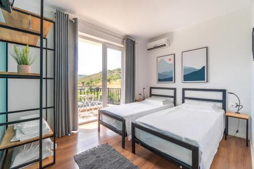Letto o letti in una camera di Guesthouse Lumo & pool