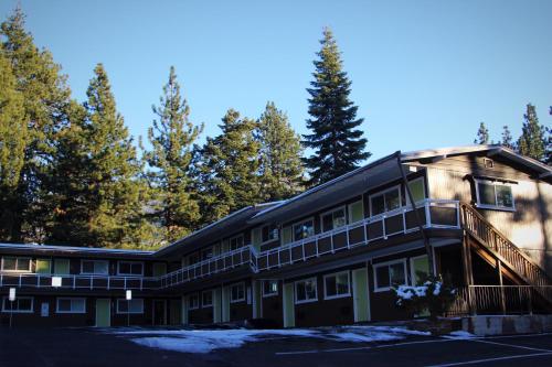 a large apartment building with a balcony at Tea Garden Lodge in South Lake Tahoe