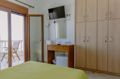 Ένα ή περισσότερα κρεβάτια σε δωμάτιο στο Villa Pasifai