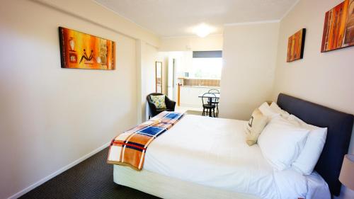 Un pat sau paturi într-o cameră la Waihi Motel
