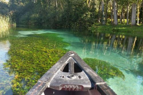 a front end of a canoe in a river at Casa vacanze Villa Raffaella in Lanciano