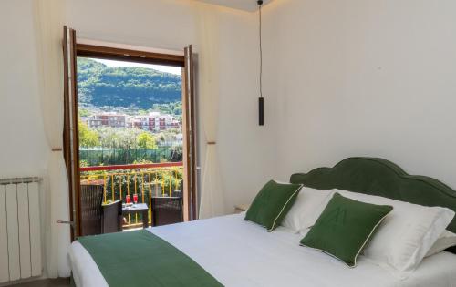 Postel nebo postele na pokoji v ubytování MIFRA SUITES