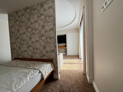 Cama o camas de una habitación en Agroturystyka Domilo Mzyki