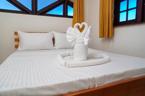 Postel nebo postele na pokoji v ubytování Seven Lotus Villa Kandy