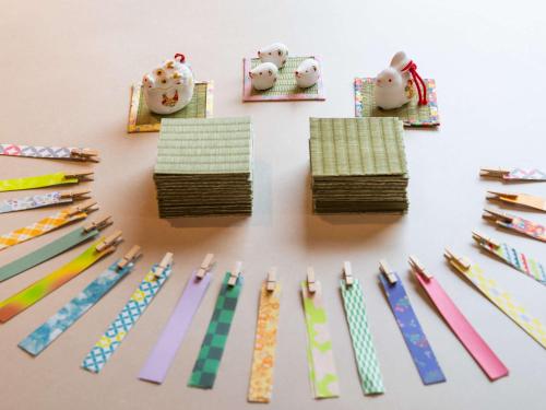 a group of ties sitting on a table next to at Grand Mercure Nara Kashihara in Kashihara