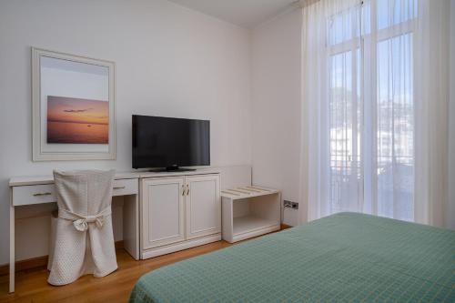 TV a/nebo společenská místnost v ubytování Lido Resort