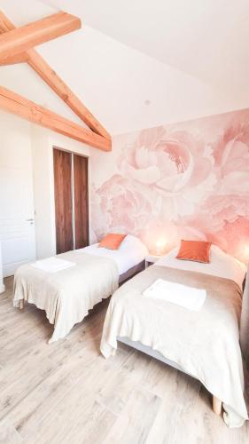 Postel nebo postele na pokoji v ubytování LE COTTAGE DU PARC