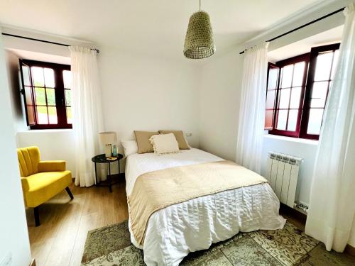 En eller flere senge i et værelse på A Calzada