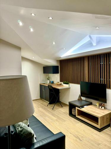 a living room with a couch and a table at Siel Residences in Perea