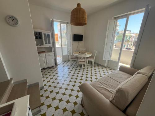 A television and/or entertainment centre at Villa Bianca, Seaside panoramic Rooftop