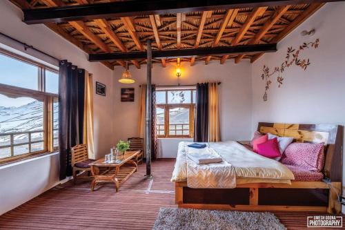 Postel nebo postele na pokoji v ubytování Pema's Cottage Chicham Kaza