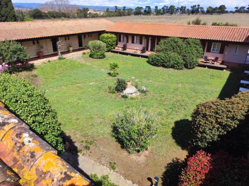 an aerial view of a garden with bushes and trees at Hôtel et Appart'Hôtel Le Relais Du Val D'Orbieu in Ornaisons