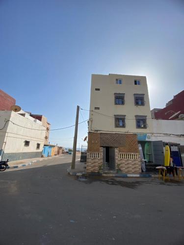 a building on the side of a street at Amazigh surf house in Agadir