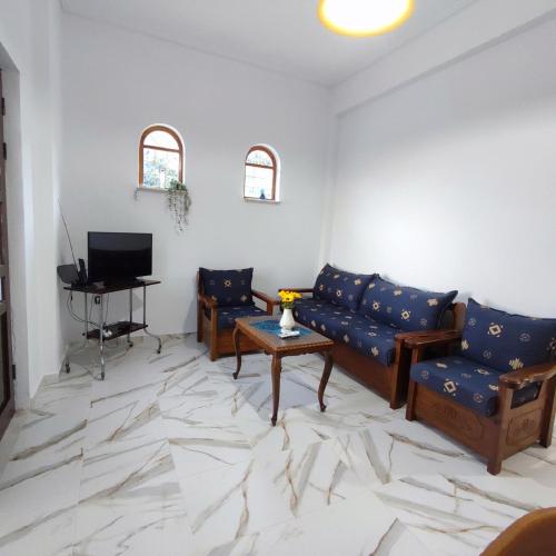 Φωτογραφία από το άλμπουμ του Voukamvilia apartment στην Παραλία Κύμης